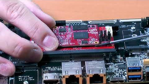 How to unmount the uCOM board from the adapter