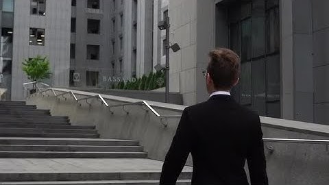 Corporate Worker Walking Staircase Stock Video