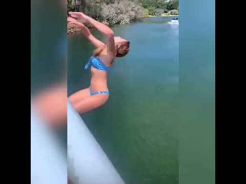 Brave young teen diving from 16 feet