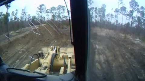 cat 953c pushing up the stock pile