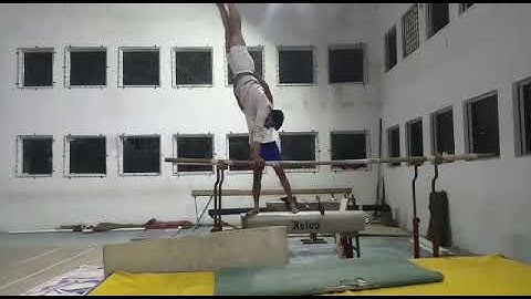 Double front dismount in parallel bar