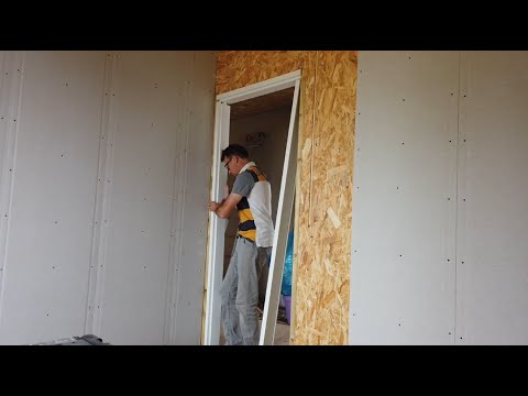 Zelf Een Huis Bouwen - Deurkozijn plaatsen