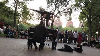 Acrobatics on Colin Huggins piano  Aryn Shelander & Jeffry Stilt perform in Washington Square Park