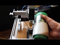 Engraving on a coffee thermos using 10 watt DPSS laser and using rotary system (a axis)