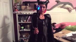 Me unboxing my Maleficent costume.