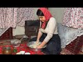 Cooking pepperoni pizza in village traditional life