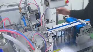 Toroidal core glue dispensing add cover machine
