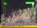 اندفاع الجماهير اتجاه الرائد خميس القذافي وهو يخرج من السيارة محي الجماهير اندفاع الجماهير اتجاه الرائد خميس القذافي وهو يخرج من السيارة محي الجماهير