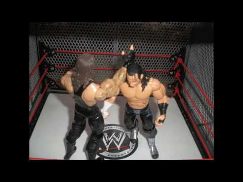 Match de catch avec figurine officiel de la WWE.Steel cage match entre Undertaker et Matt Hardy pour dÃ©terminer le prochain combattant d'Evan Bourne pour son titre Extreme de la WWFM.