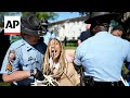 Police detain demonstrators on emory universitys campus in atlanta