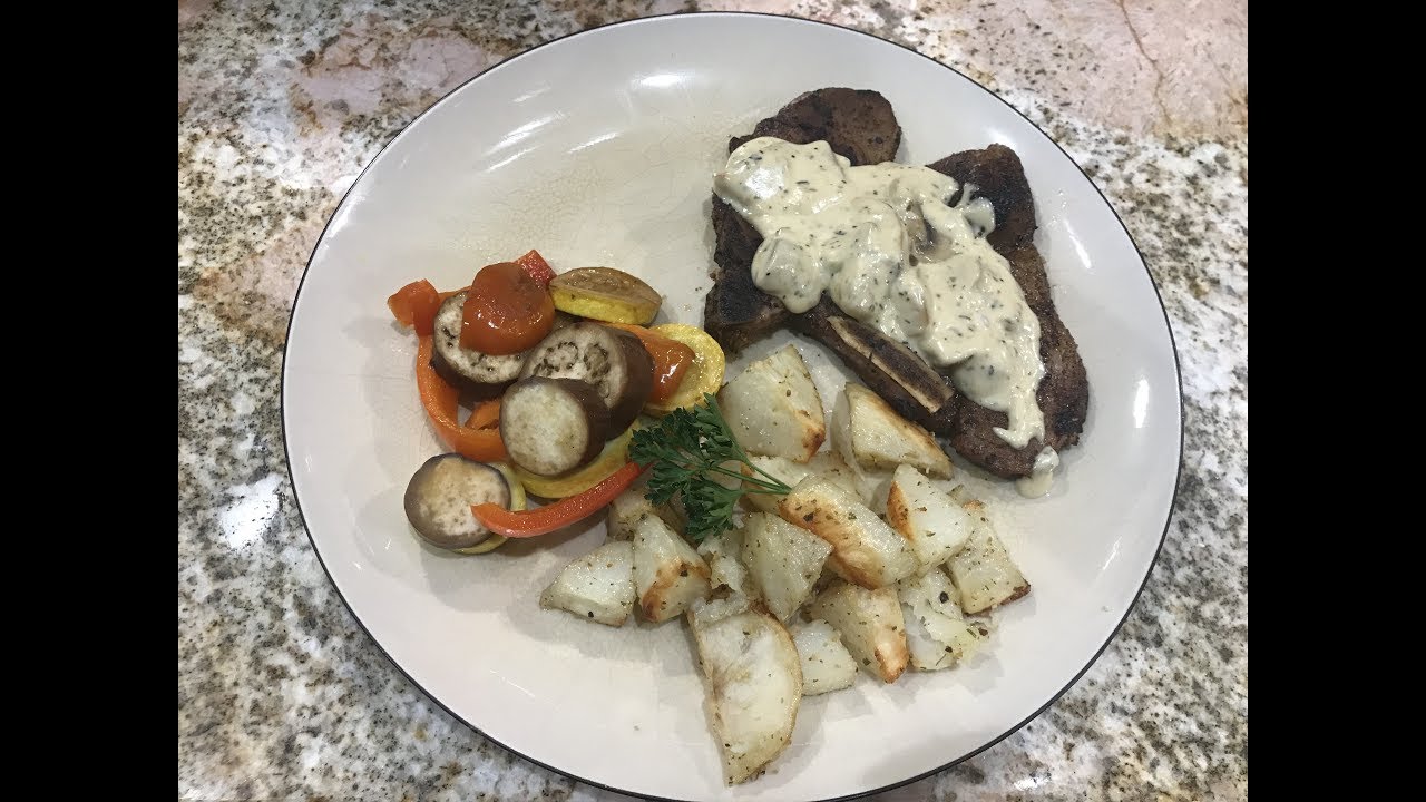 Pan seared pork chops in mushroom white wine cream sauce YouTube