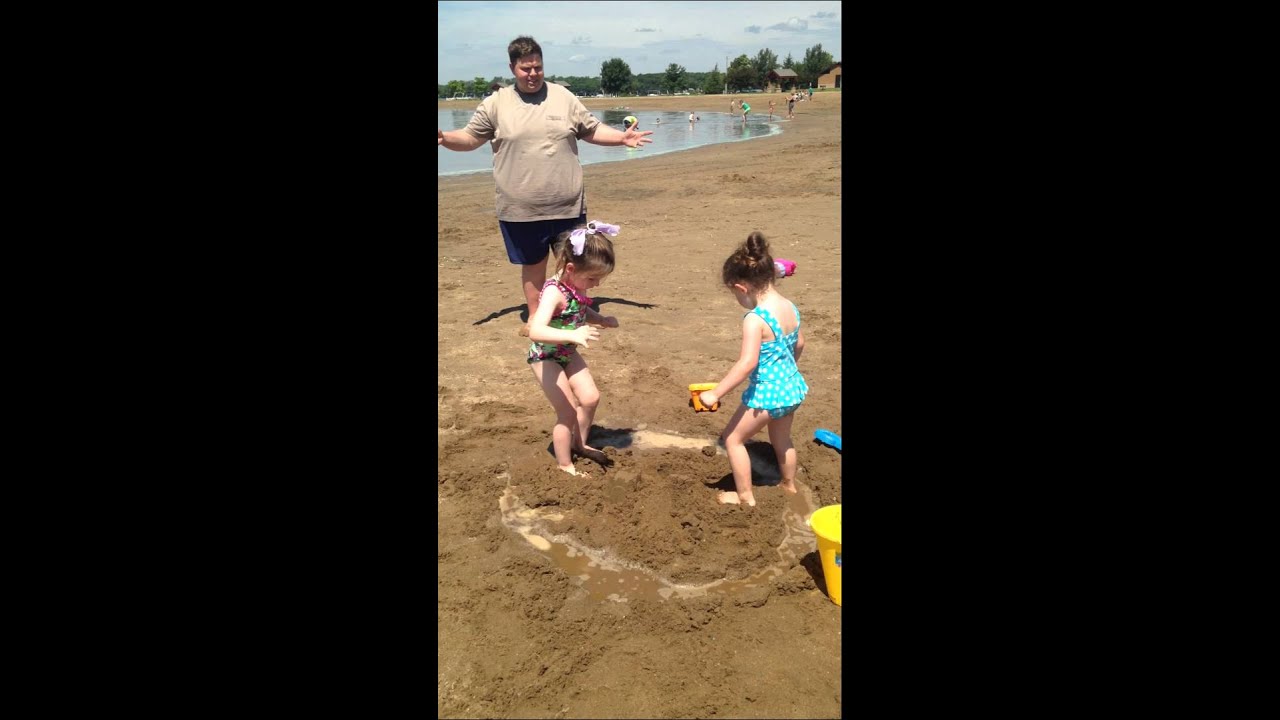 Stomping sand castle July 2014