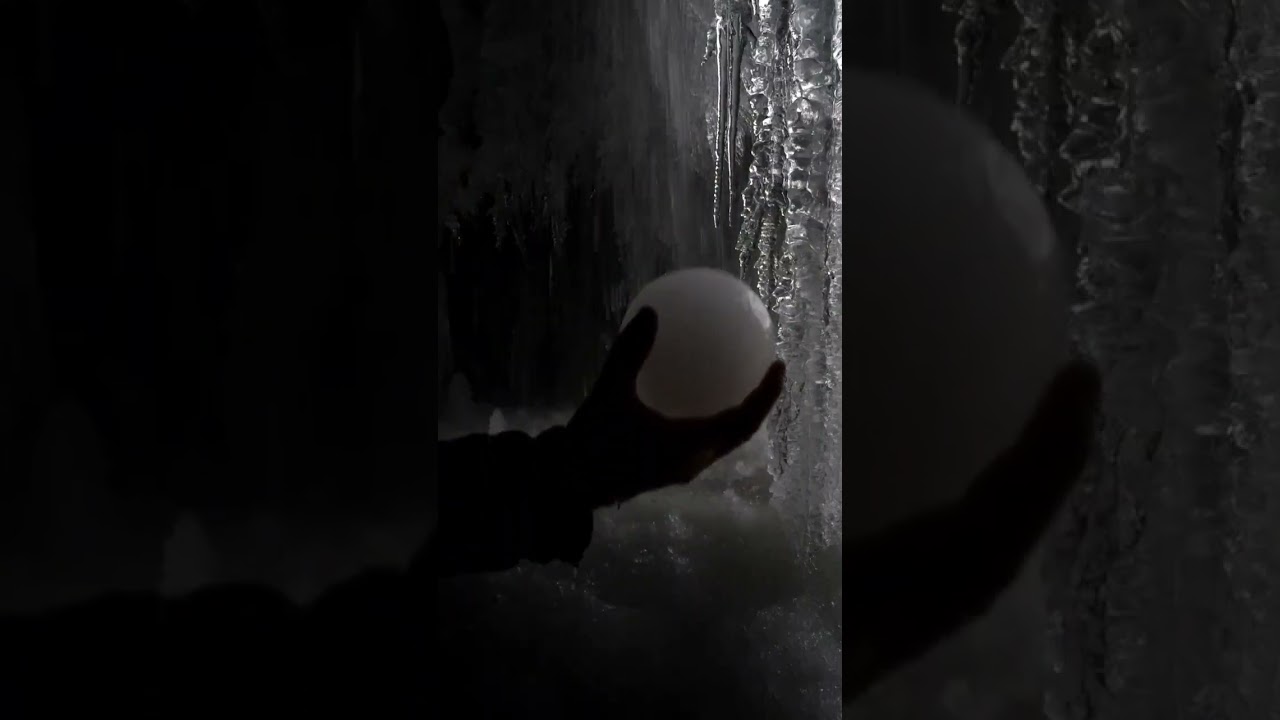 Absolutely perfect ice balls formed by  the rolling action of falling water in this waterfall