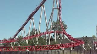 Maverick off ride POV. View from road. Two trains. Cedar Point.