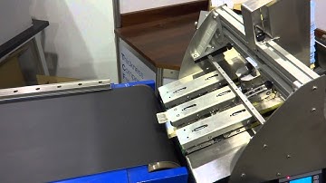 Friction feeder - Vacuumatic TCF - Inline model counting scratch cards demonstrating speed of count