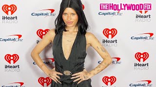 Nessa Barrett Shows Off Her Tattoos In A Sleeveless Black Dress At The iHeartRadio Jingle Ball