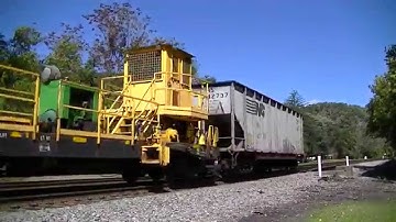 Norfolk Southern MOW train pulls long load of Continuous Welded Rail CWR