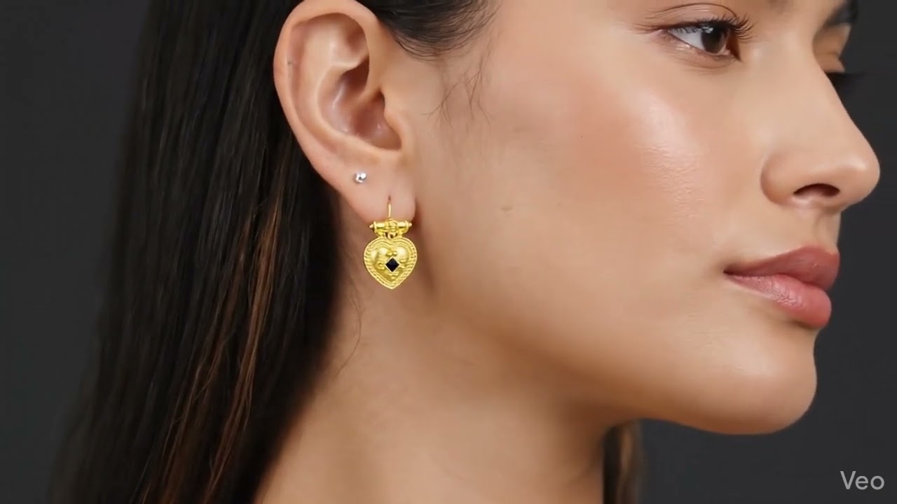 Gold Heart Shaped Earrings with Black Swarovski Crystal Accent on Model