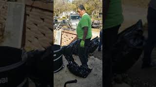 Milton Trying To Figure Out How To Use Trash Bags