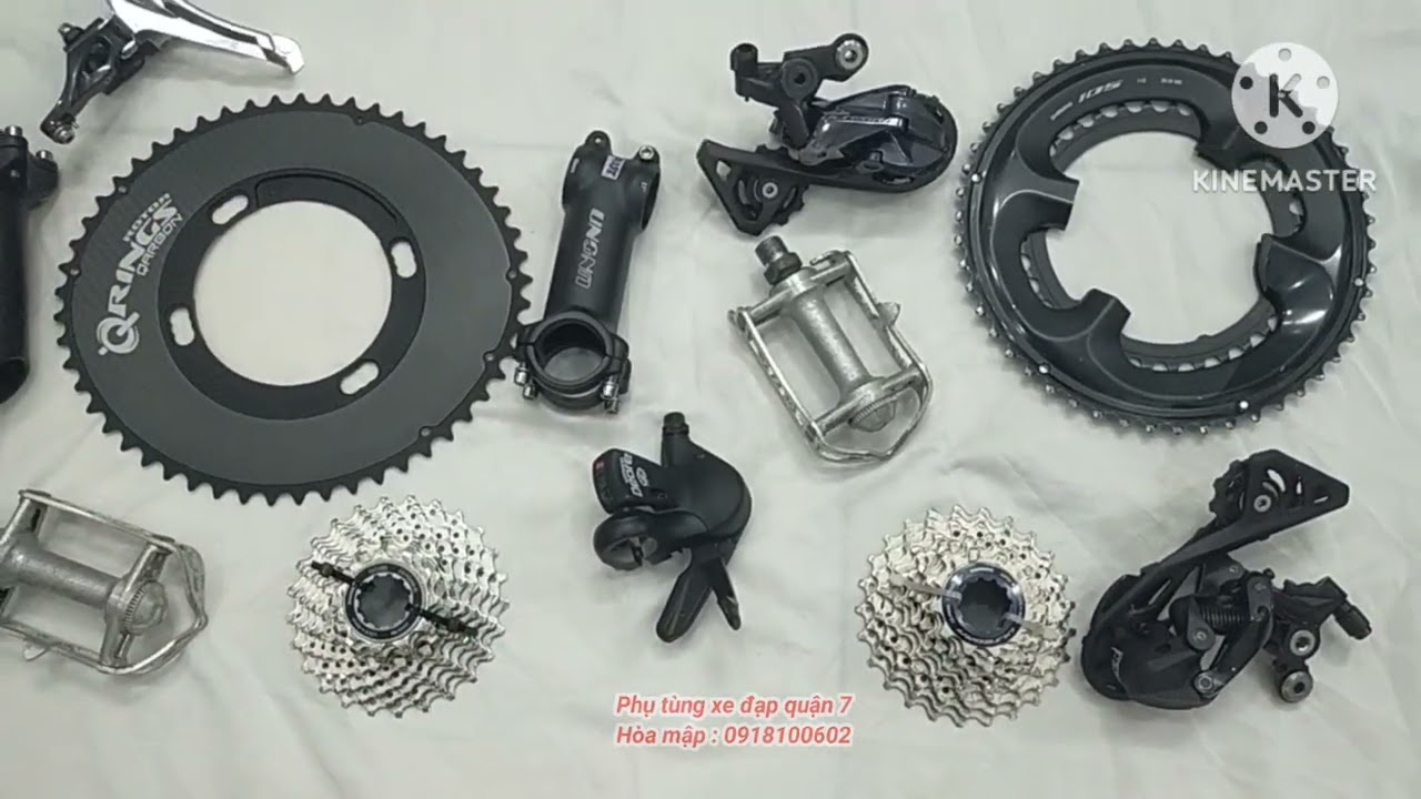 #300- Phụ tùng xe đạp q7 : Lá dĩa Roto QRINGS, R7000; Líp R8000, HG500; Bấm xã M510; Pedal ; Potang