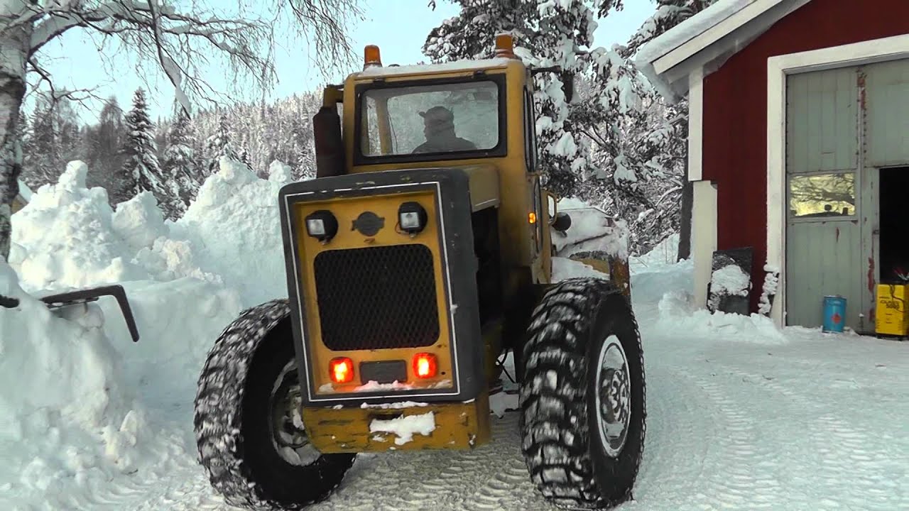 Asj Parca 854 carry away a pile of snow 1/3