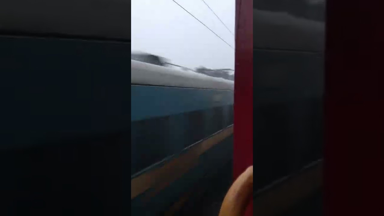 SUPER FAST TRAIN tearing through Heavy Rain! 