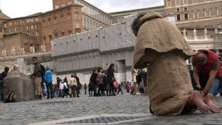 Pilgrims crowd St Peter's square ahead of conclave