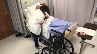 Transferring a resident from bed to wheelchair