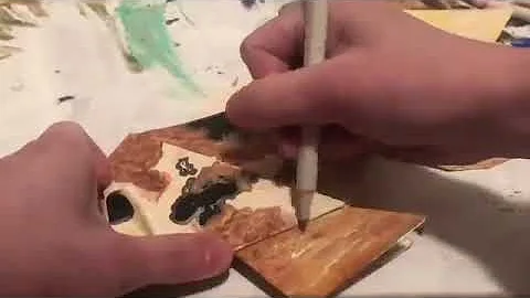 Painting an Origami Fish Sculpture