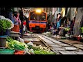 World's most dangerous Maeklong Railway market Thailand | train market in Thailand - shockwave
