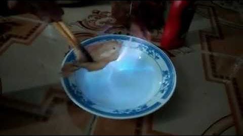 Nướng mực khô bằng rượu Bầu đá Bình Định