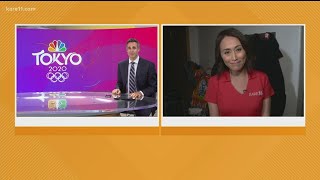 KARE 11's Gia Vang watches Suni Lee in Tokyo with the Lee family