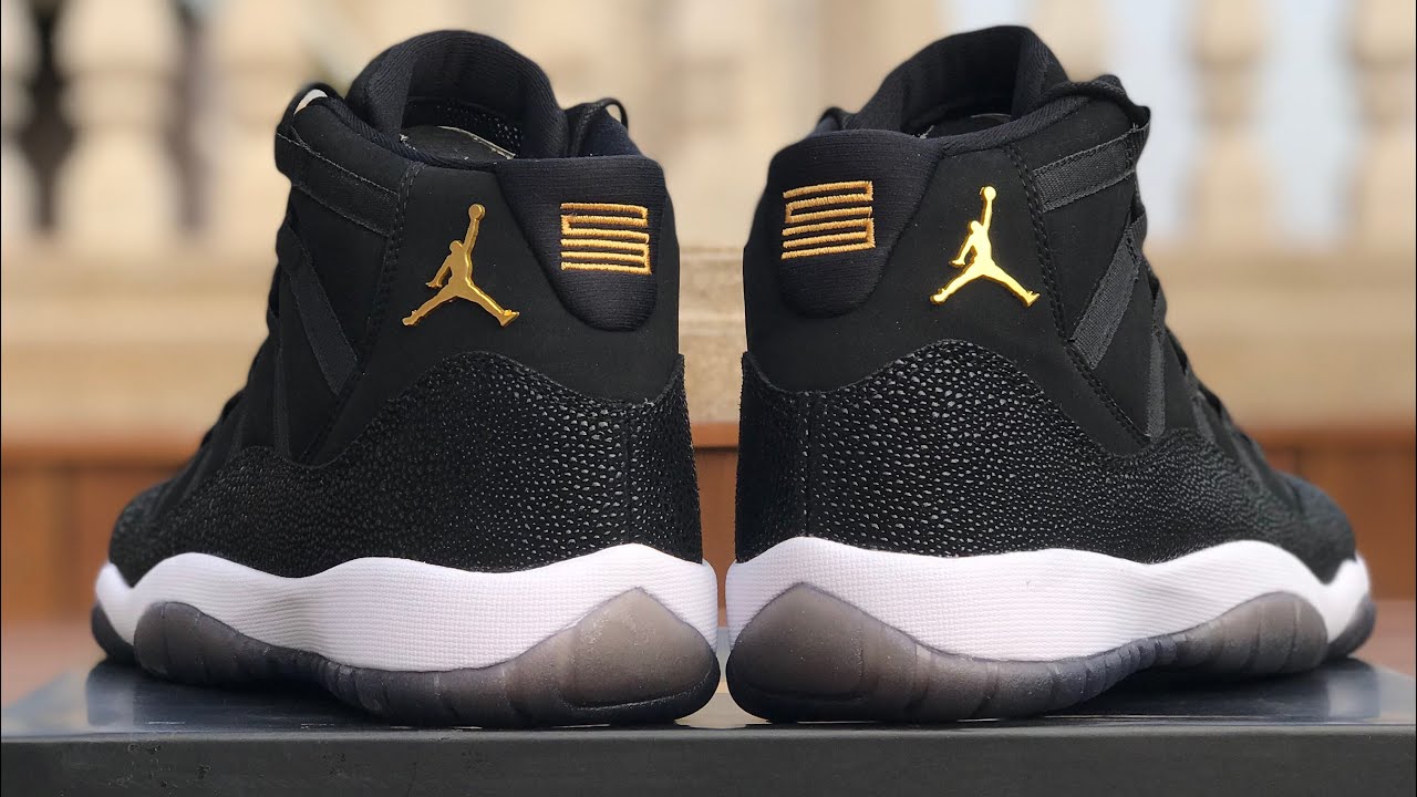 black and gold 11s