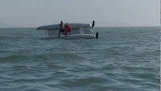 Paul teaches Audrey how to resurrect a capsized catamaran sailboat