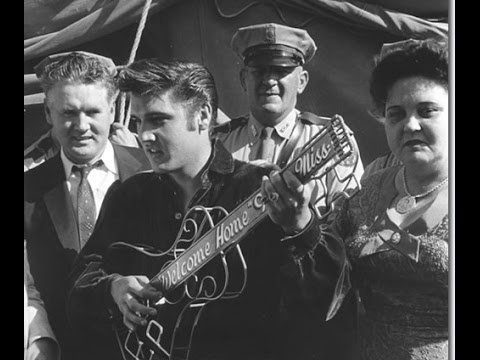 Image result for images of  Elvis with his parents, 1956.