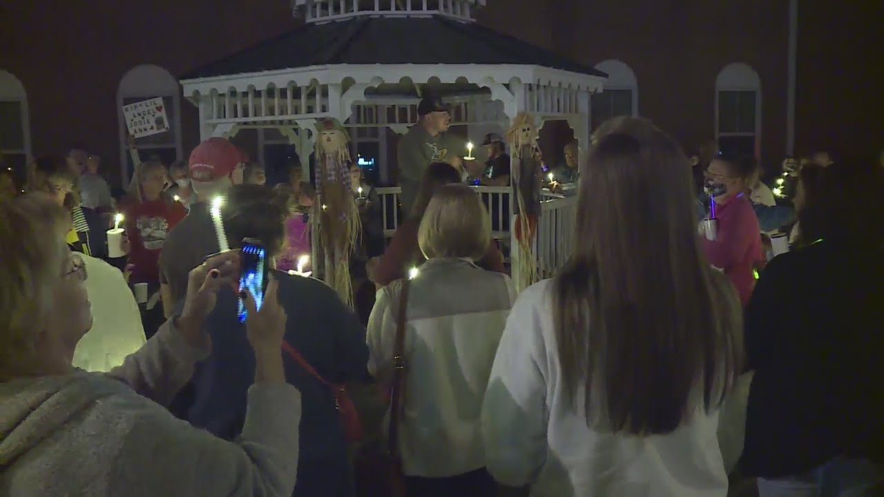 Missouri town holds vigil after adoptive parents charged in death of emaciated 10-year-old