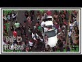 Money Thrown Into Crowded Street (Daytona Beach) | Helicopter Cam | United States | 20200523