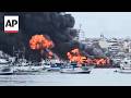 At least 2 injured after fishing boats catch fire in Ecuador