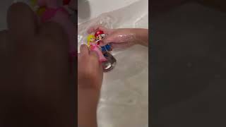 Mario saves Princess Peach from drowning in the sink Mario saves Princess Peach from drowning in the sink