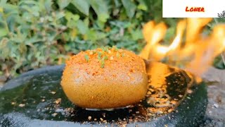 Simply roast a kiwi fruit, put it on a stone, and bite it down.