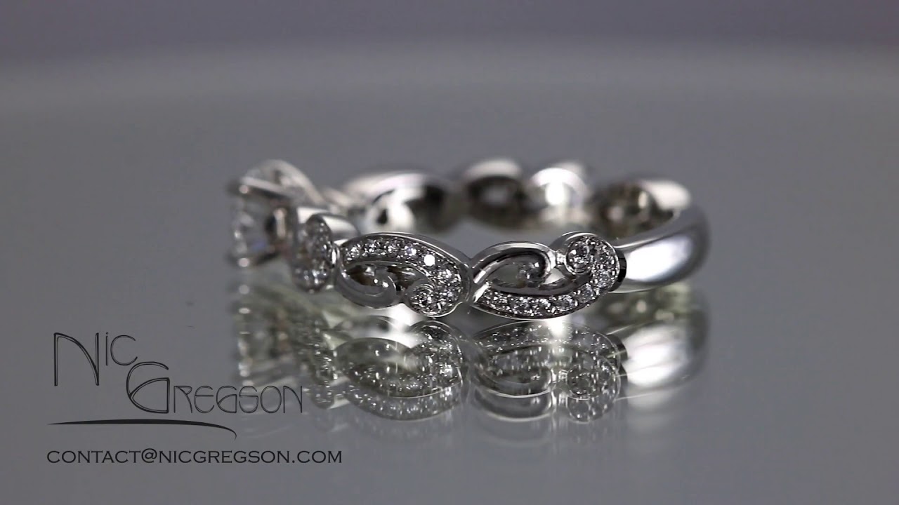 Platinum and diamond scroll ring - YouTube