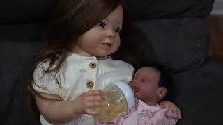 Silicone Baby Sisters Exploding Diaper Change Magnolia helps with the baby