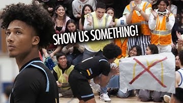 Mikey Williams HOSTILE CROWD puts up UNBELIEVABLE McDonalds All American sign!