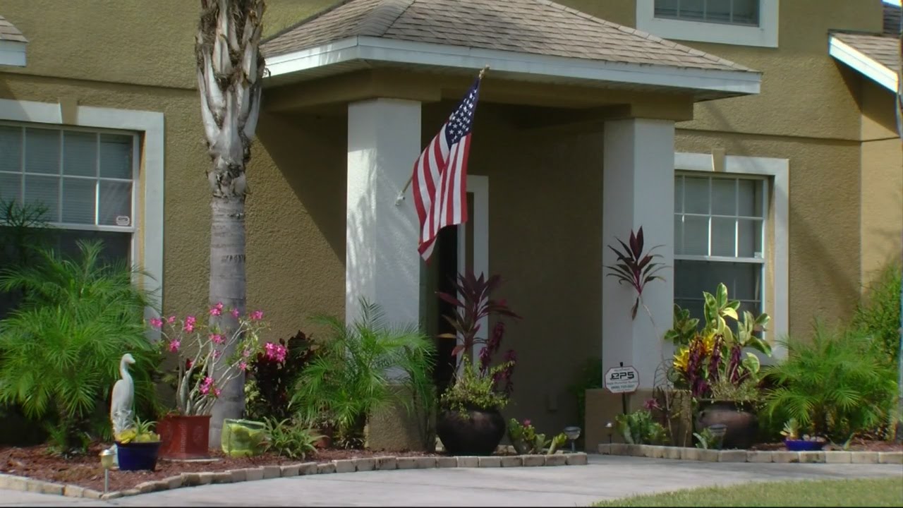 Neighbors react after police take SUV