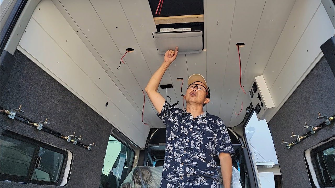 DYI Sprinter van conversion-Solar panels,  Shiplap paint,  exterior lighting