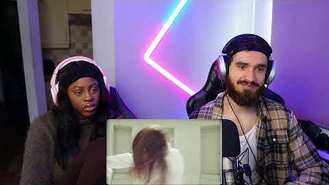 Thumbnail of Couple Reacting to Tate McRae - Revolving door (Official Video) 😱
