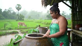 Rain Bath By The Water Jar Serene Village Woman In Peaceful Countryside Scene