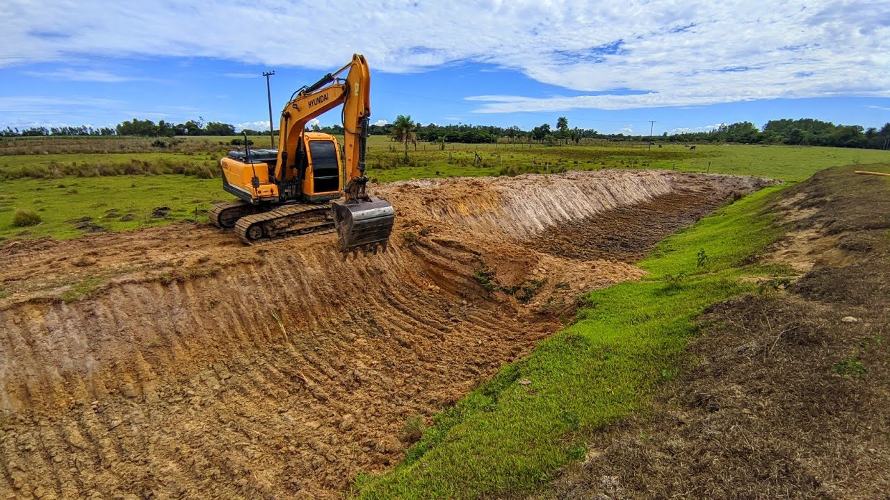 FAZENDO LIMPEZA DE TANQUE DE PEIXE 🐟 - Escavadeira hidráulica Op Wagner