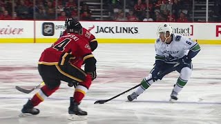 Boeser weaves through Flames beats Gillies with wrist shot