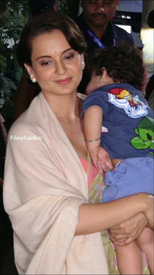 #kanganaranaut poses for the paps with her sweet nephew Ashwatthama ? #filmykalakar